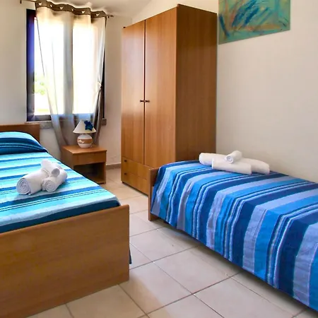 Aparthotel Isa-residence With Swimming-pool In Ottiolu Just 250 Mt From The Sea, With Air Conditioning And Private Outdoor Area